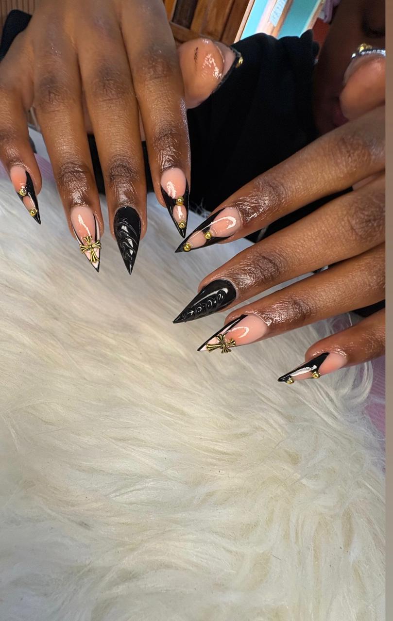 Black and gold stiletto nail art